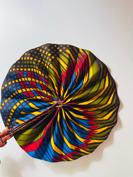 Handcrafted African Ankara Folding Fan – Multicolor Spiral Pattern with Leather Handle