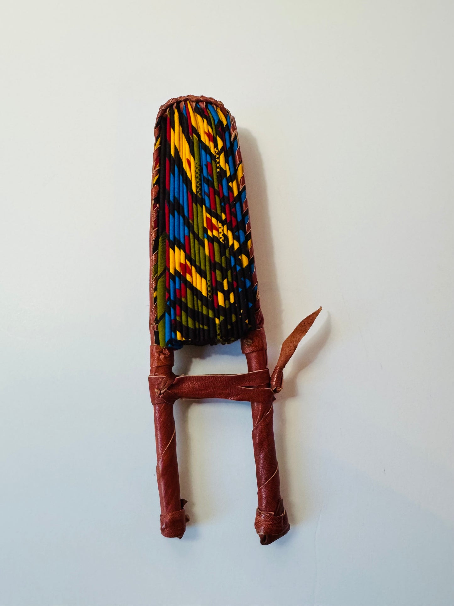 Handcrafted African Ankara Folding Fan – Multicolor Spiral Pattern with Leather Handle