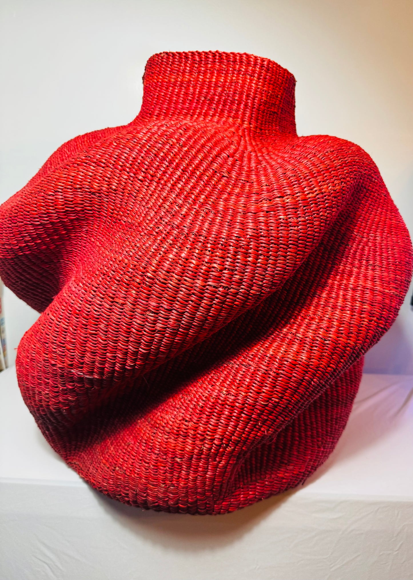 Wavy Red Art Basket – Handwoven Sculpture from Ghana