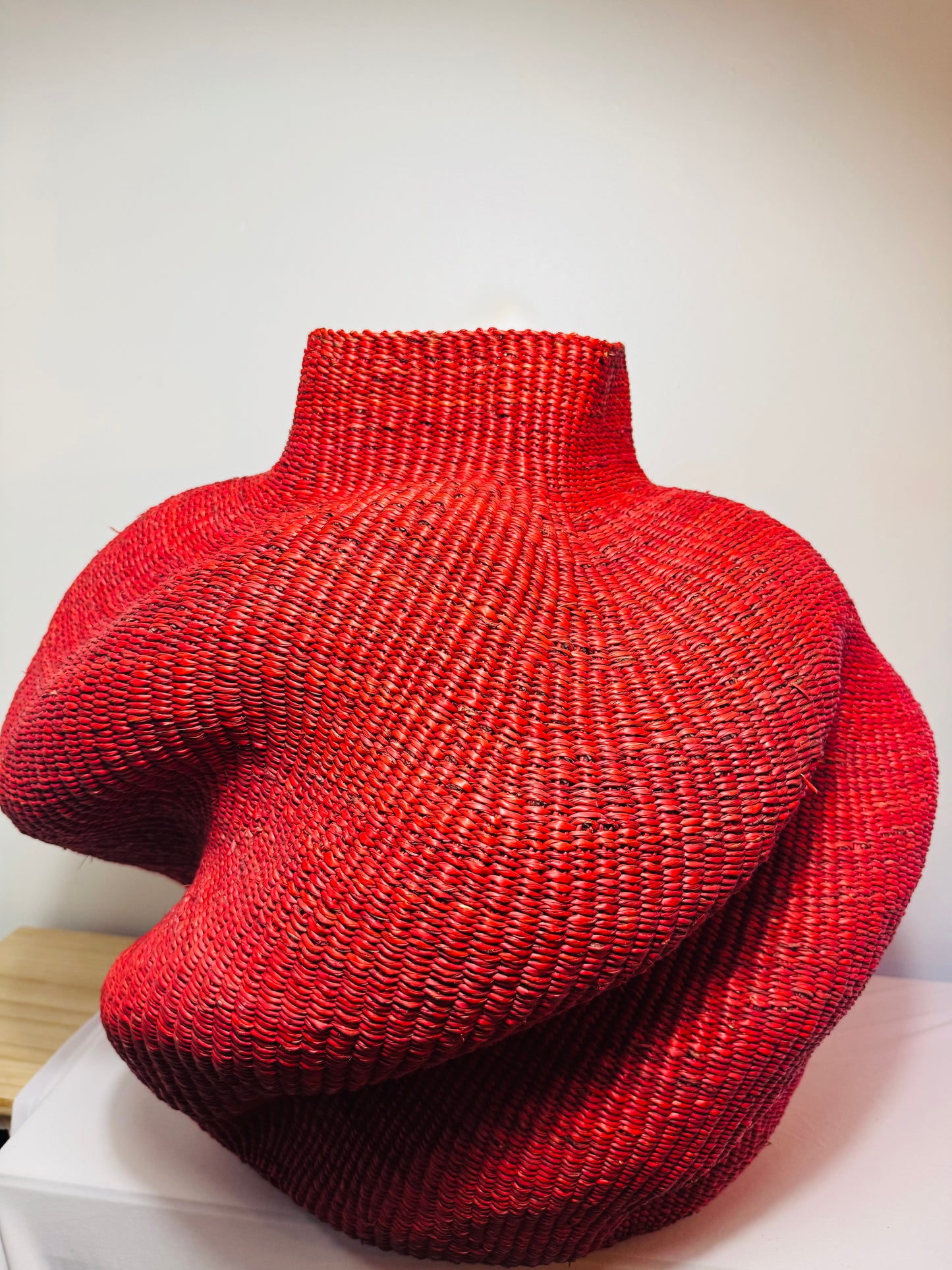 Wavy Red Art Basket – Handwoven Sculpture from Ghana