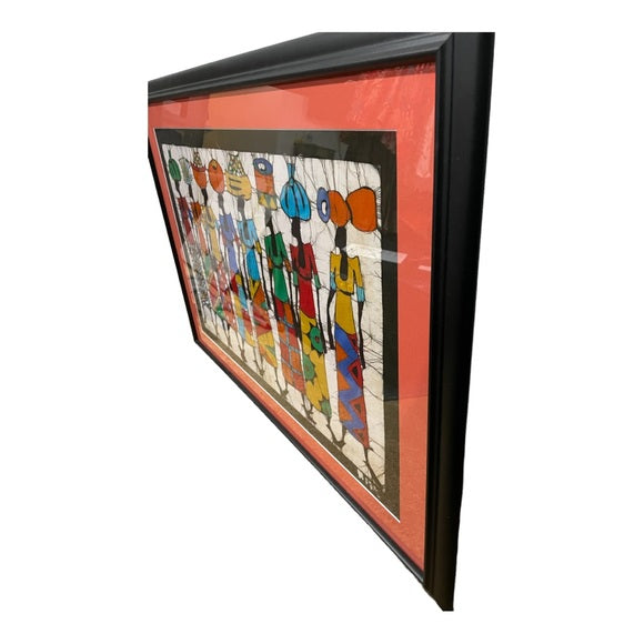 Framed art - a batik of colorful women